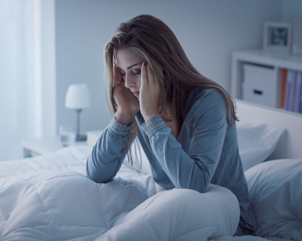 Depressed woman awake in the night